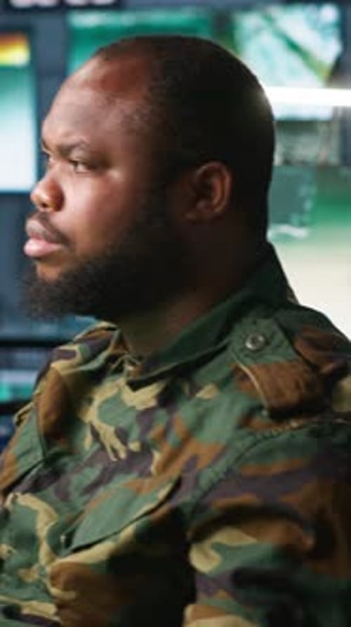 Vertical Video Counterintelligence Specialist in Military HQ Base Gathering Information