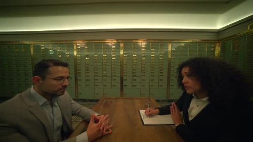 Two Professionals in Thought in the Vault Room