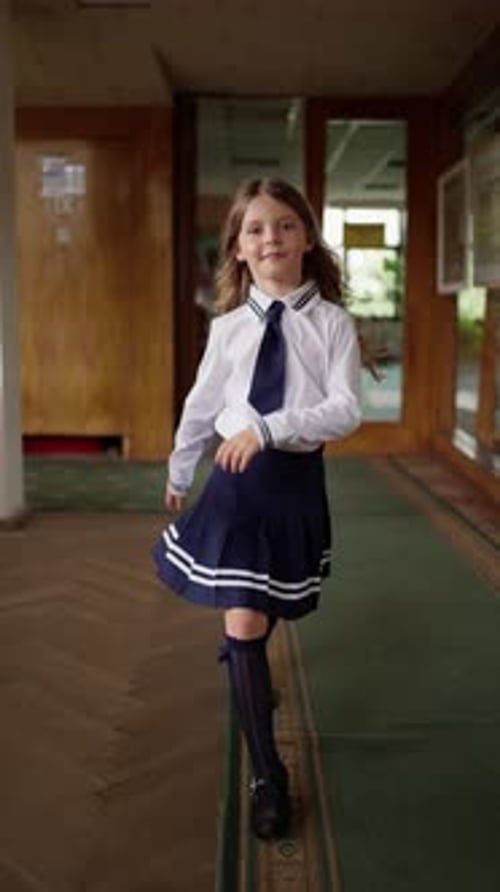 Girl in School Uniform Runs Along Corridor Concept of School Life