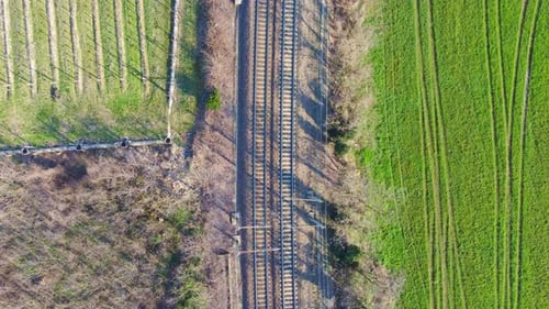 Birds Eye View Aerial of Railway Tracks Through Rural Farmland