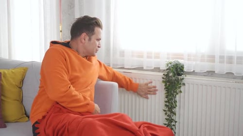 A video about a man who has a heating problem at home.