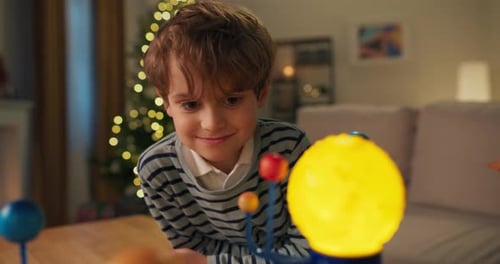 Handsome Boy with Brown Hair Explores the Planet