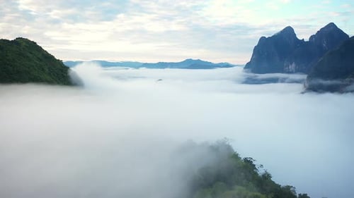 Aerial View Of Tropical Mountain And Rain Forest Landscape In The Morning Mist