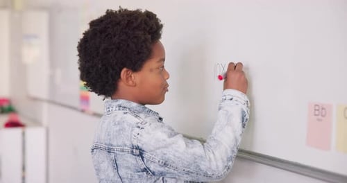 Math class, child at writing on board for education, learning and problem solving for skill
