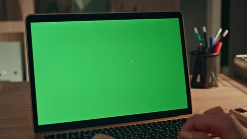 Unknown Freelancer Using Mockup Laptop for Online Work at Home Office Closeup