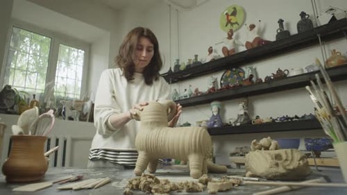 Creative Mess When Working with Clay in Ceramic Workshop