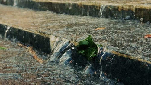 Water Flowing Gracefully Over Stone Steps