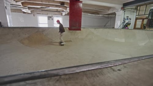 Professional Female Skateboarder Training at Skatepark