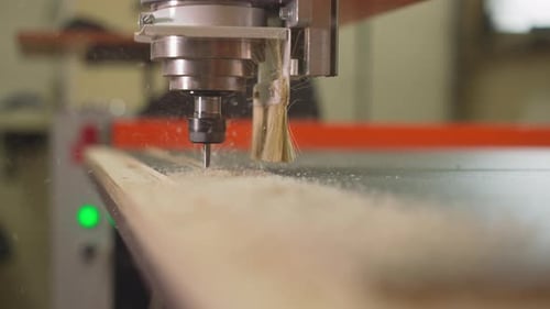 Cutting Out Plywood Details with Automatic Drill at Plant