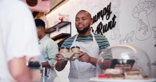 Takeaway, coffee and barista giving customer a order in cafe, service and black man in small