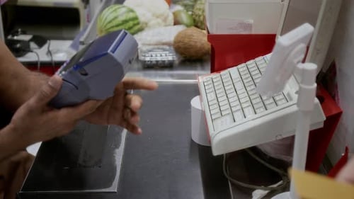 Customer Paying Via Credit Card in Store