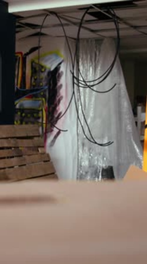 Vertical Video Empty Building with Destroyed Items and Graffiti Paint