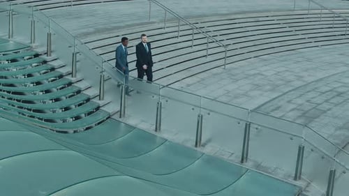 Businessmen Walking Together in Urban Setting