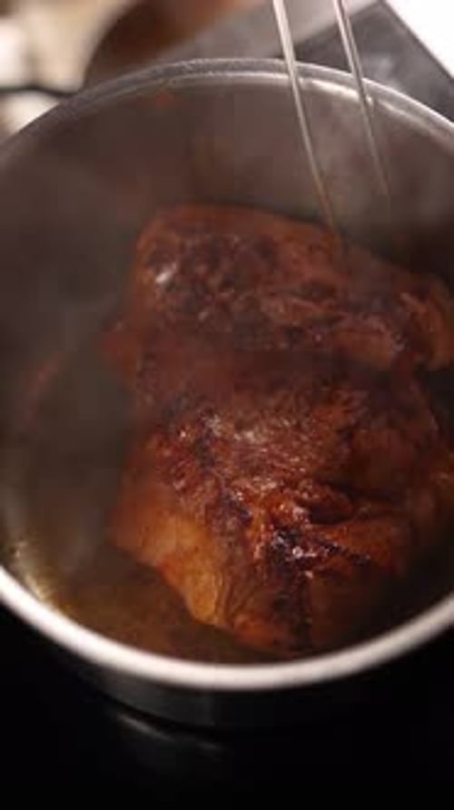 Pork with spices stewed in a saucepan