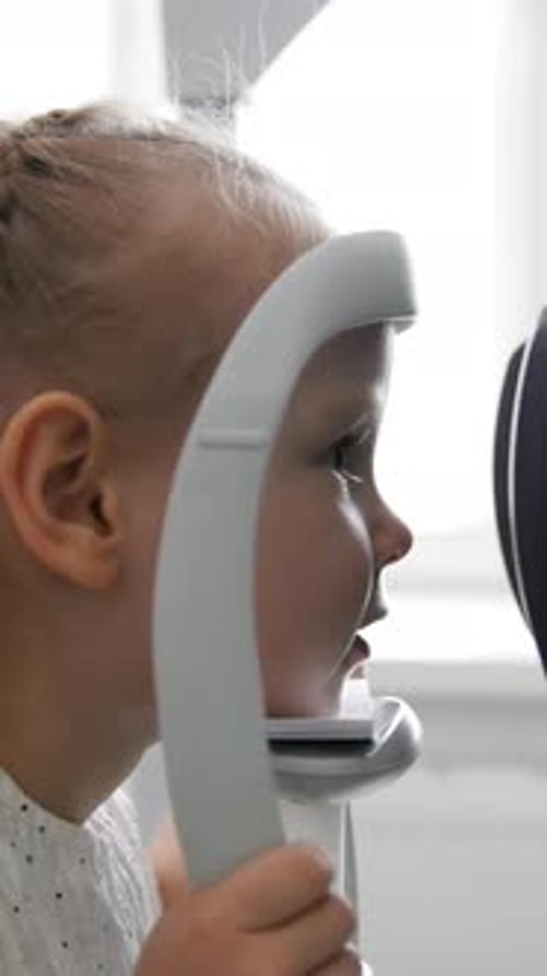 Children Ophthalmology Optometrist Checks Child's Eye