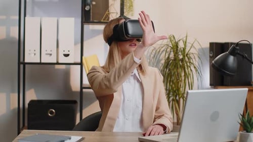 Woman Using VR Headset in Modern Office