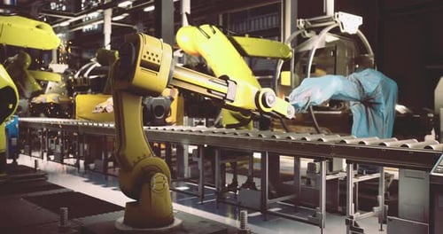 Des bras robotiques avancés fonctionnent dans une usine de fabrication moderne