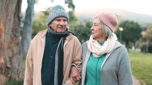 Old couple, walking and talking in park together for morning exercise, love in marriage