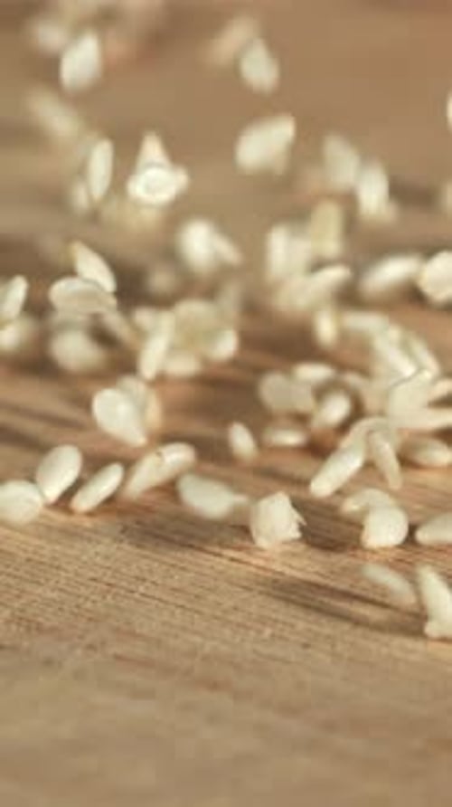 Falling Sesame Seeds on the Table