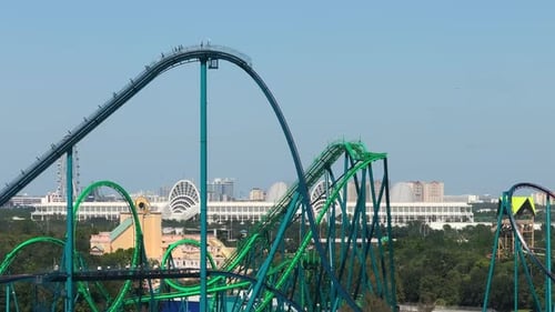 Excited Fun of Enjoying Thrilling Rollercoaster at Amusement Park in Orlando Florida