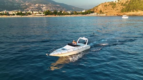 Sports Boat Sails and Makes Beautiful Turns Aerial View 4 K