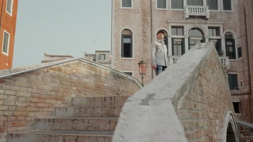 Man Admiring Venice's Architectural Beauty