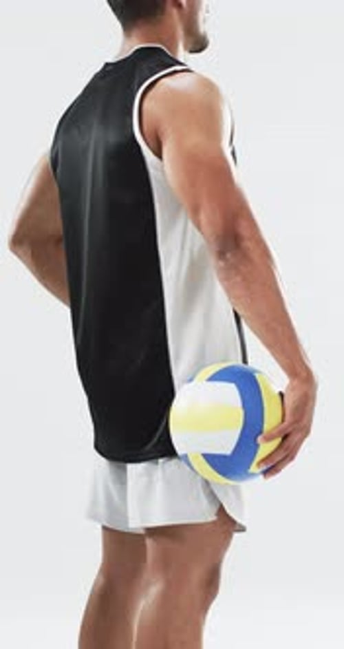 Man Holds Volleyball in White Space