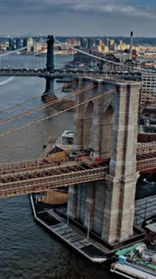Brooklyn Bridge aerial view showcasing New York skyline and waterfront