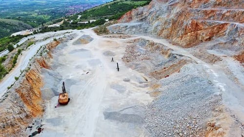 Natural Quarry is Located Near Road Against Backdrop of Rhodope Mountains and Hills with Forests and