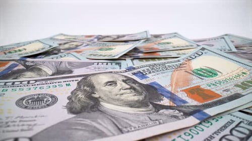 United States Dollar (USD) banknotes close up on white background isolated 4K