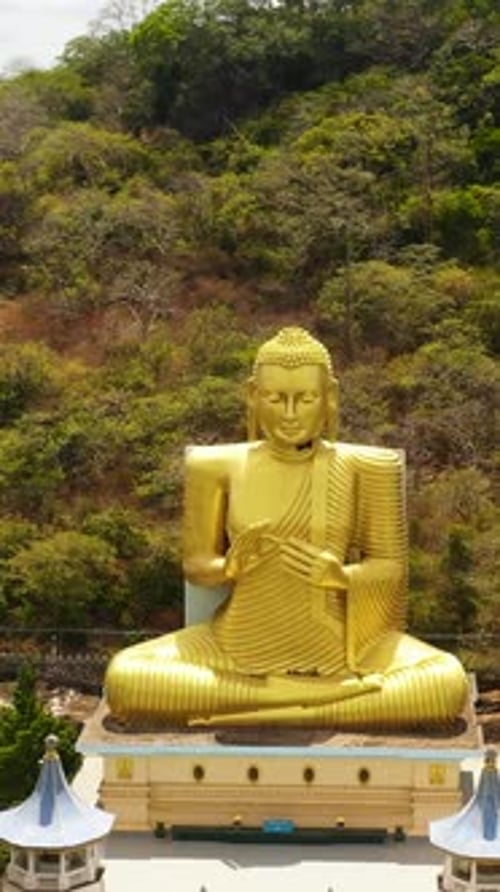 Aerial View of Buddhist Temple with a Buddha Statue in the Mountains Sri Lanka