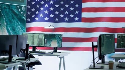 Empty Tech Office with American Flag Backdrop