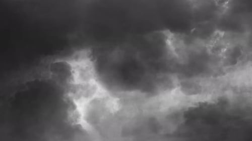 4k view of dark clouds in the dark sky and a thunderstorm