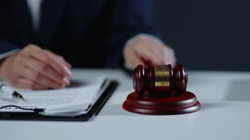 Gavel Strikes Block near Legal Agreement