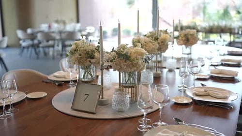 Elegant Wedding Table Setting with Floral Decorations