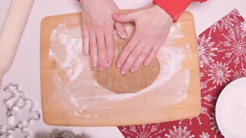Top View of Women Hands in a Red Sweater Preparing Dough for Christmas Cookies