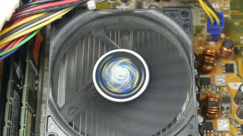 Dirty cooler spinning. Working fan.