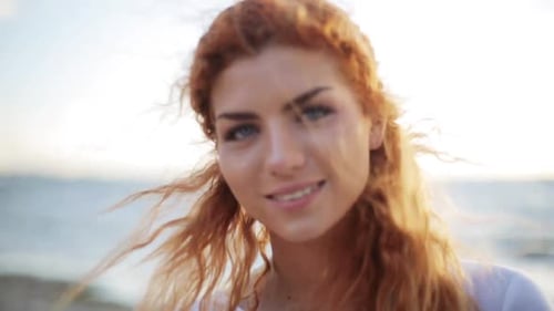 People, Facial Expression And Emotion Concept - Happy Young Redhead Woman Face On Beach