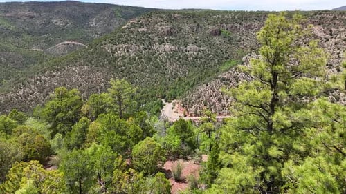 Aerial view of winding road through mountains, United States.