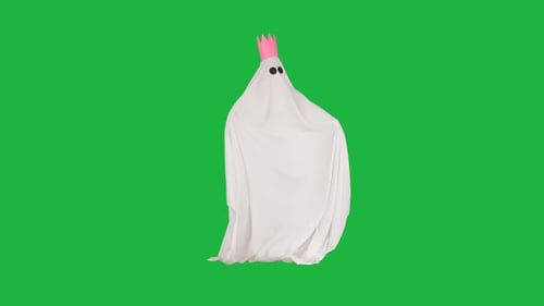 Halloween Ghost in White Sheet and Pink Crown Posing Moving Hands at Camera Isolated on Chroma Key