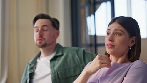 Involved Pair Watching Horror Movie at Home Closeup Nervous Couple Looking Tv