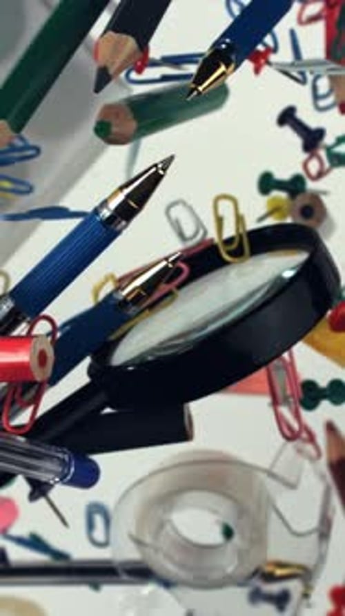 Different School Tools Fly Up and Down Back to School Filmed on a Highspeed Camera at 1000 Fps