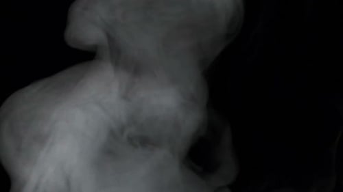 Ethereal Grey Smoke Rising on Black Background