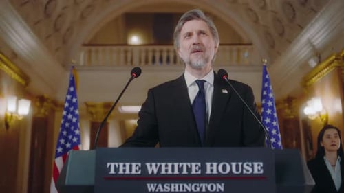 Man Giving Speech at White House Podium