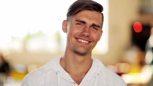 People, Emotion and Facial Expression Concept - Face of Happy Smiling Young