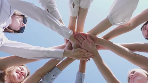 Diverse Team Building Bonding Hands in a Circle