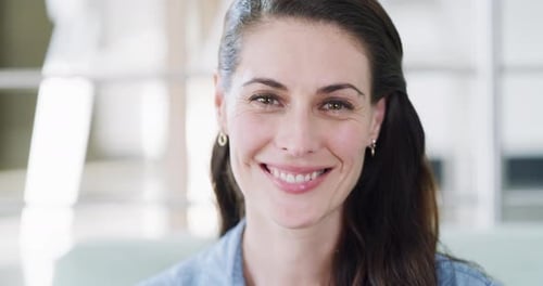 4k footage of a beautiful young woman spending the day at home
