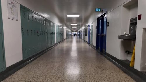 Modern school hallway walking shot