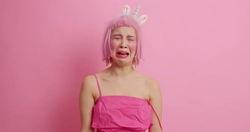 Woman with Pink Hair Crying with Makeup Running