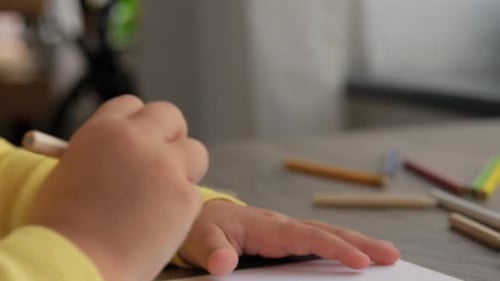 Childhood, Creativity And Art Concept - Closeup View Of Little Girl With Coloring Pencils Drawing...